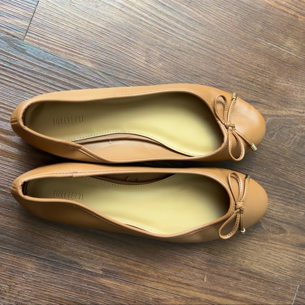 Brown ballet flats with bows